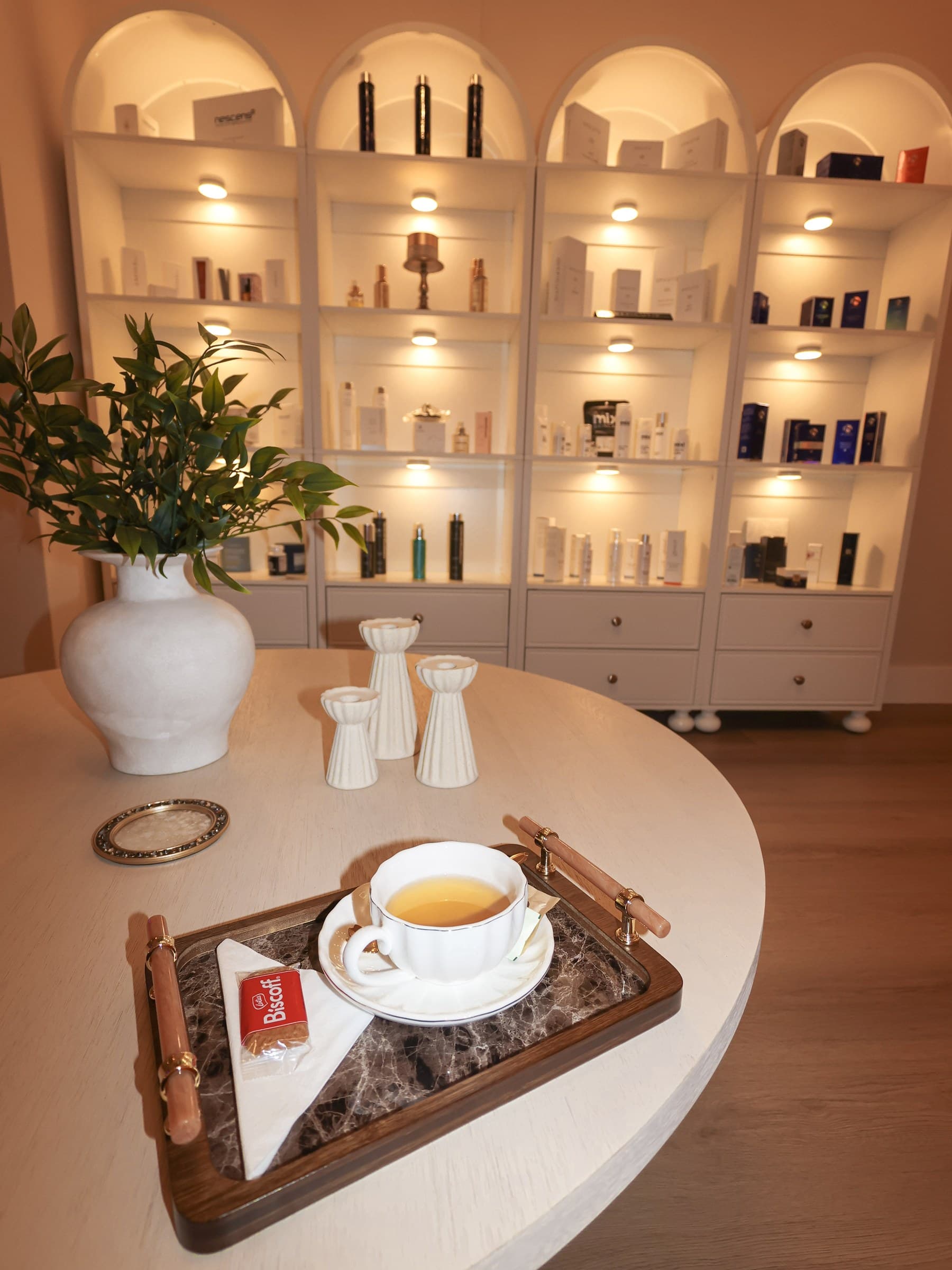 Tea service on a wooden tray in the Skin House of Beauty lounge