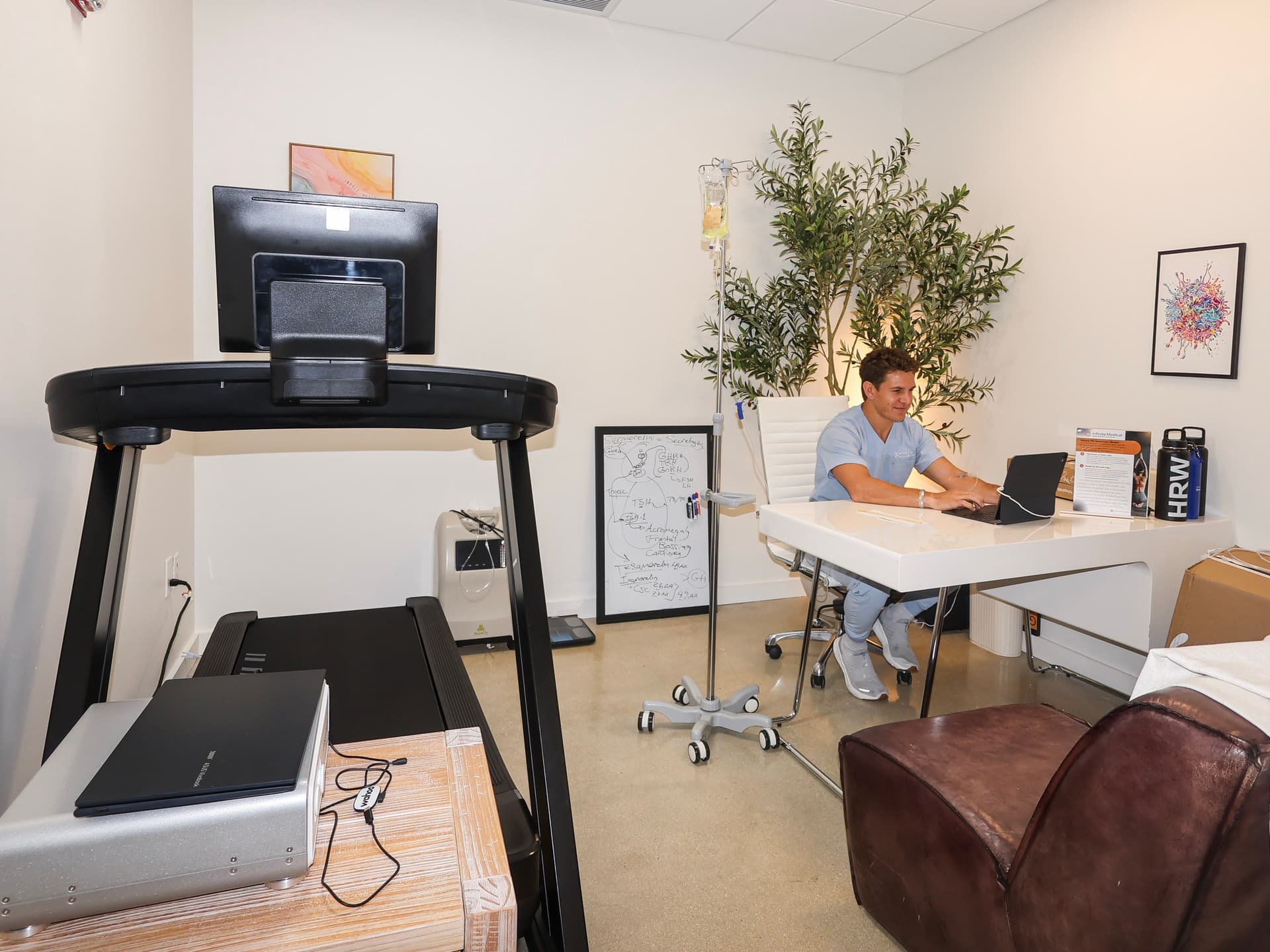 A treadmill and testing equipment in a work room at Evolve Longevity in Miami Beach.