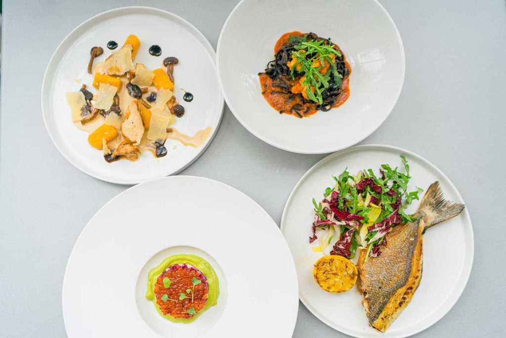 The Best Miami Restaurants to Go on New Year's Day - Casa Isola Osteria, CJ's Crab Shack, Costa Med, Lightkeepers, Lobster Shack, Pubbelly Sushi, RED South Beach, Riviera Focacceria Italiana, The Wagyu Bar - November 2025